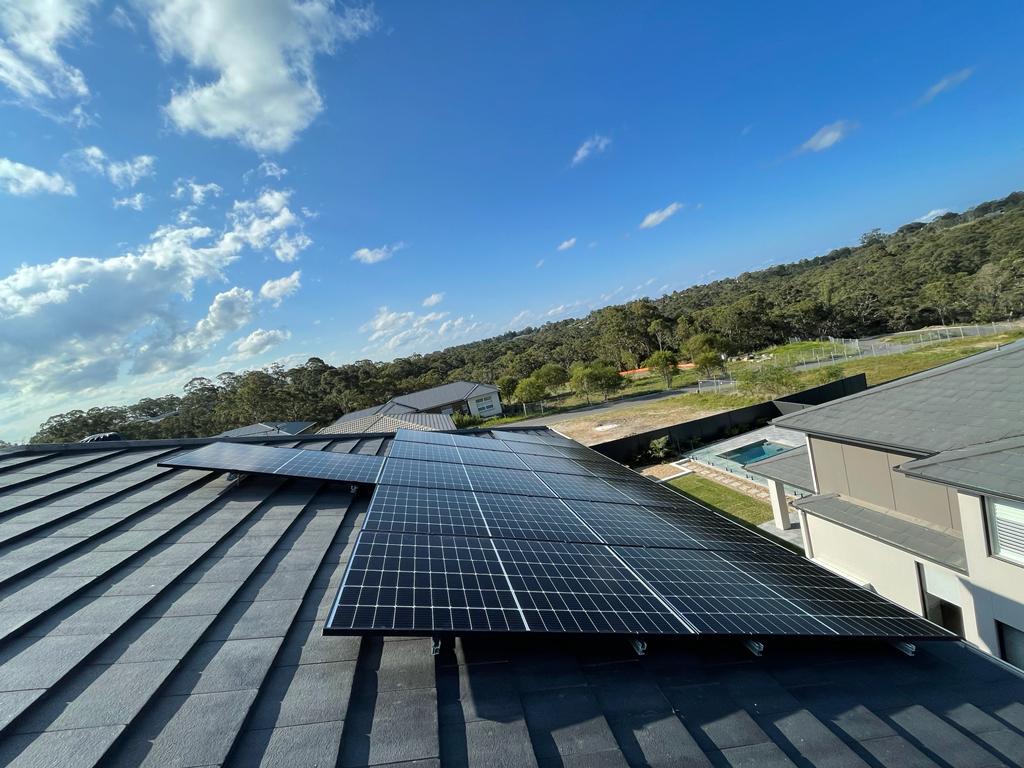 REC Solar panel installation on rooftop